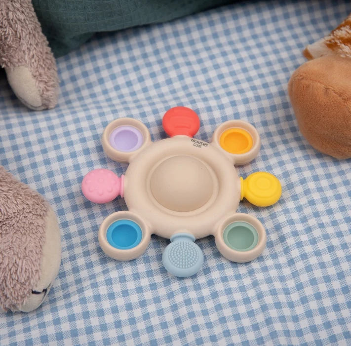 Rammelaar / Bijtspeelgoed - Druk Gaatjes Regenboogkleuren